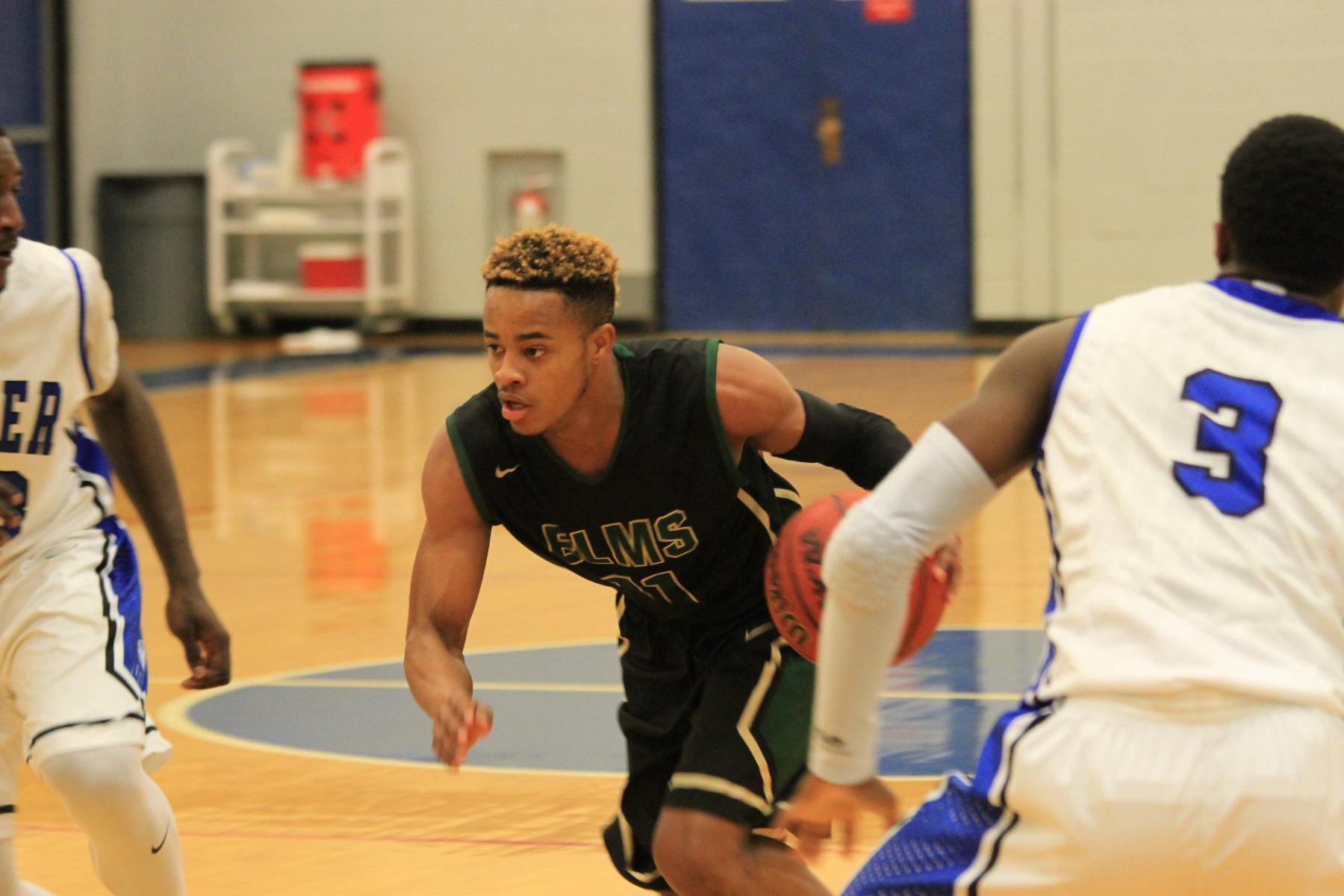 Men's Basketball Outlasts Becker