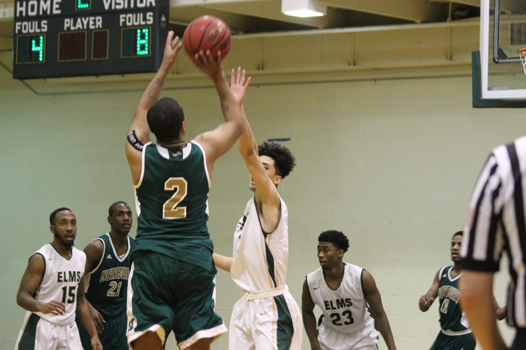 Buzzer Beater Lifts Newbury Over Men's Basketball