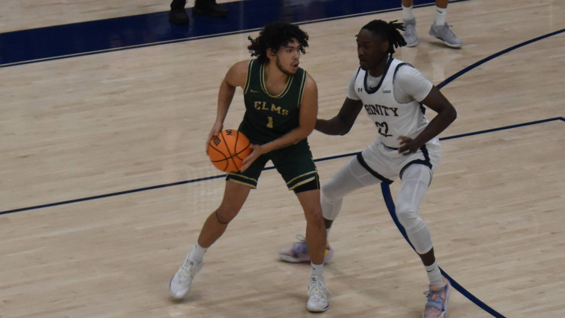 Men's Hoops Beaten on the Road by the Monks